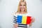 Young girl holding Romanian flag