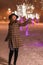 Young girl holding sparklers for christmas during winter alone i