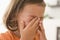 Young girl indoors crying