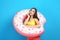 Young girl with inflatable donut