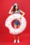 Young girl with inflatable donut