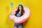 Young girl with inflatable donut