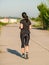 Young girl jogging in the morning. Woman working out on Lacul Morii or Windmill lake in Bucharest