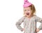 Young girl kid surprised shout in birthday party pink cap