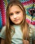 Young Girl With Long Hair Holding an Umbrella