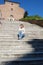 Young girl, long staircase, ancient architecture, dilapidated buildings