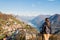 Young girl looking at the panoramic scenery at Monte Bre, Lugano, Switzerland