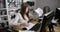 A young girl is looking for the right document among the scattered papers