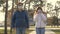 Young girl and man wear a protective mask on street, showing like. people wear medical mask for viruses, show class