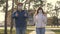 Young girl and man wear a protective mask on street, showing like. people wear medical mask for viruses, show class