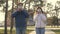 Young girl and man wear a protective mask on street, showing like. people wear medical mask for viruses, show class