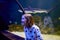 Young Girl Marvels at Sharks Swimming Above in Oceanarium Tunnel