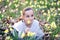 Young girl in the middle of daffodils