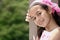 young girl of mix parentage on a garden terrace