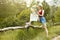 Young girl on nature with hat and map. Summer