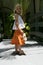 Young girl in orange skirt