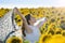 Young girl outdoors in summer sunflower field