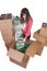 Young girl packing up and moving - isolated