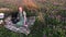 Young girl on picnic in the meadow listening to the record on vintage gramophone