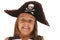 Young girl in pirate\'s hat pulling a very funny face