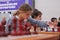 Young girl playing chess