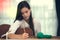 Young girl playing guitar and compose music