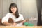 Young girl playing guitar and compose music