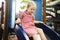 Young girl playing slide in playground