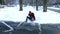 Young girl playing in snow