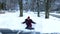 Young girl playing in snow