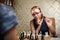 Young girl plays chess at home.