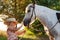 Young girl with pony.