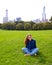 Young girl posing at Sheep Meadow in Central Park, NY, New York