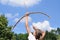 Young girl practising archery