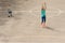 Young girl practising on a basketball court