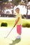 Young Girl Practising Golf