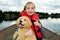 Young Girl with a Puppy on a boat