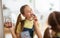 Young Girl Putting On Lipstick, Looking At Mirror