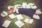 Young girl reading a book while lying in the grass. A girl among the books in the summer garden