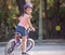 Young girl riding bicycle