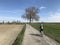 Young girl riding a bike in Polish countryside