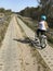 Young girl riding a bike in Polish countryside