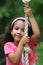 Young Girl On Rope Swing