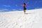 Young girl running down on Lancelinsand dunes Western Australia