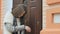 Young girl searches keys from entrance door inside the bag