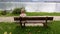 Young girl sitting alone on a bench