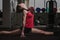 Young girl sitting on gymnastic splits