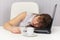 Young girl sleeps on laptop keyboard