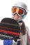 Young girl snowboarder in the helmet and glasses holds its Board and smiling