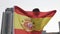 Young girl soccer fan holding a flag of Spain in the city, championship concept 50 fps